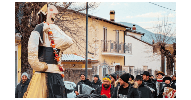 Colorful Abruzzo festival scene featuring a giant puppet and local musicians in a village setting.